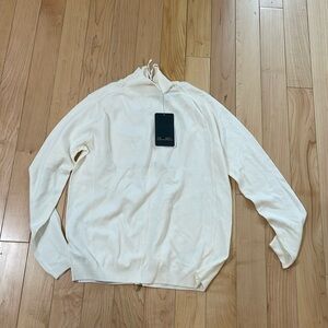 Knitted sweater/blouse new with tag.